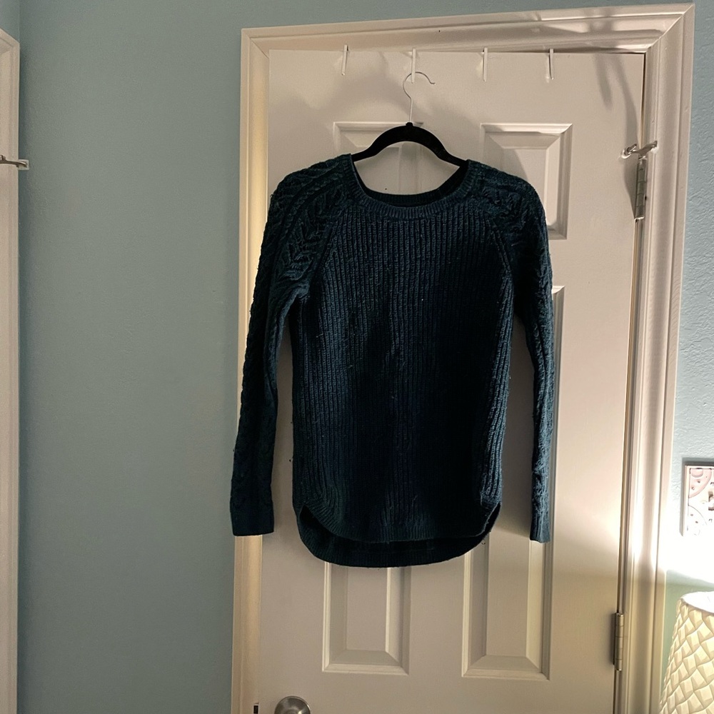 Dark green sweater